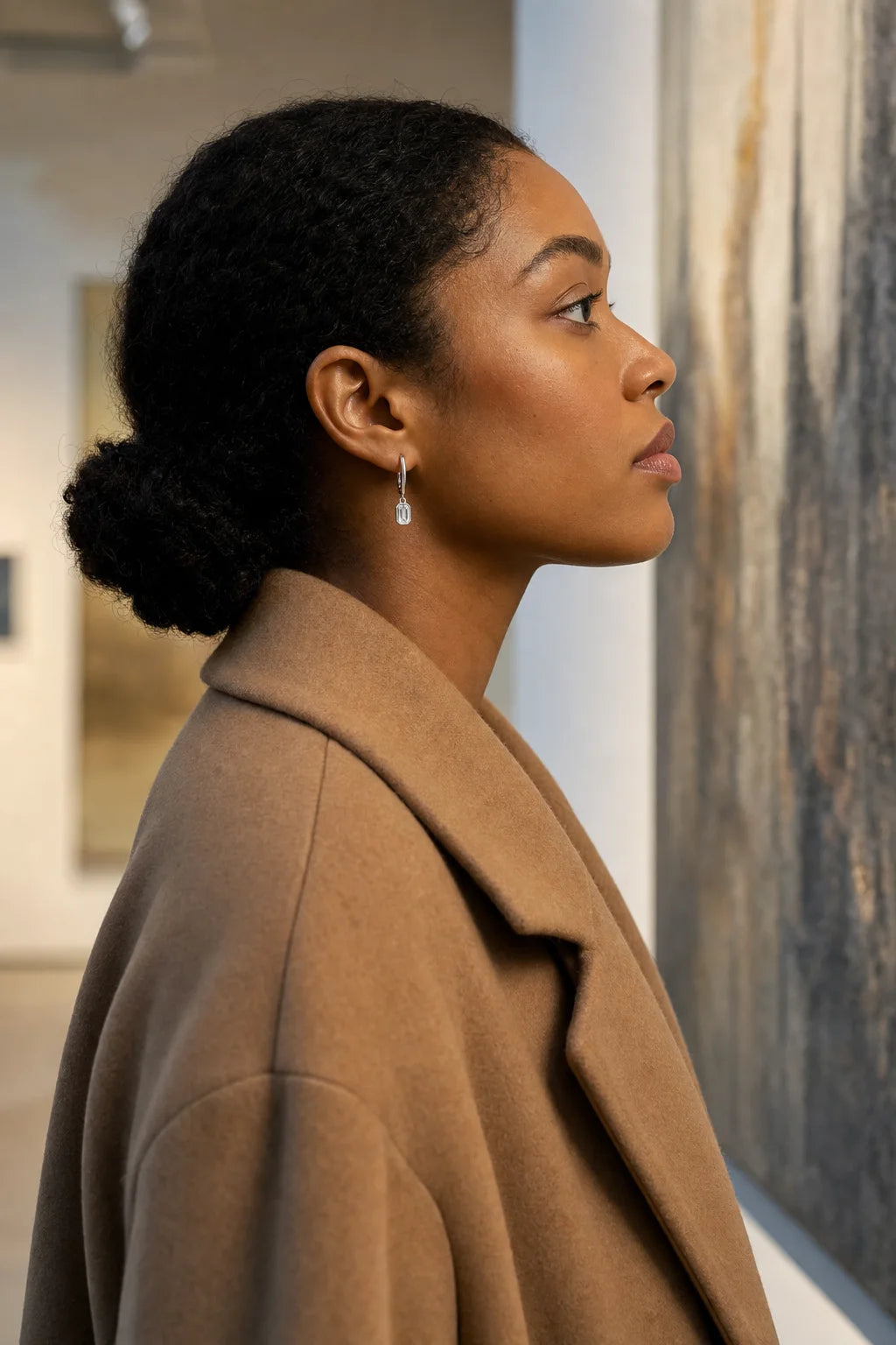 Reflet Earrings styled in an editorial setting