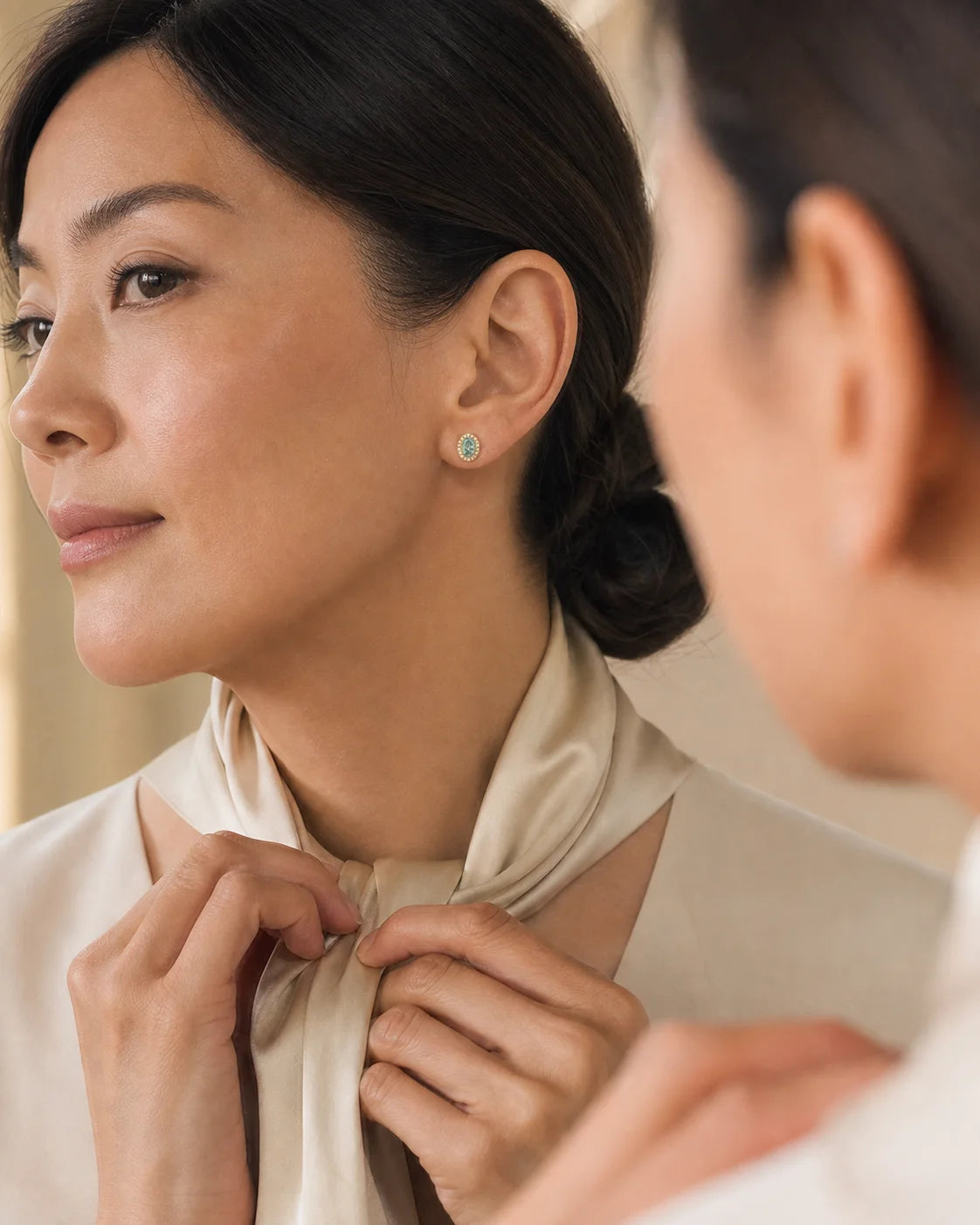 Aurore Earrings styled in an editorial setting