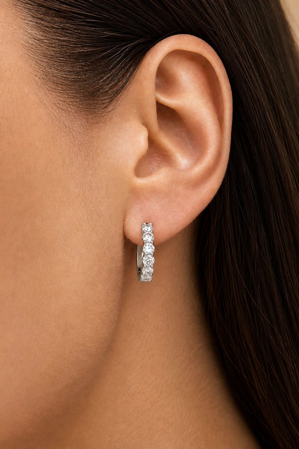Rivière Earrings worn for a distinct occasion