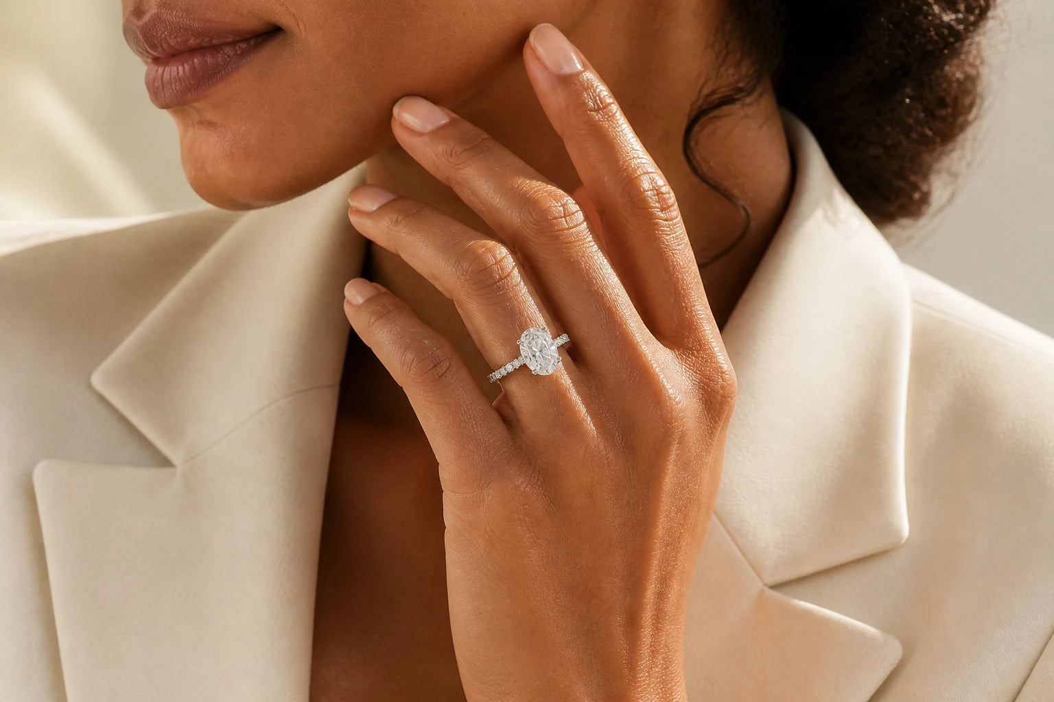 Woman wearing an oval lab-grown diamond engagement ring