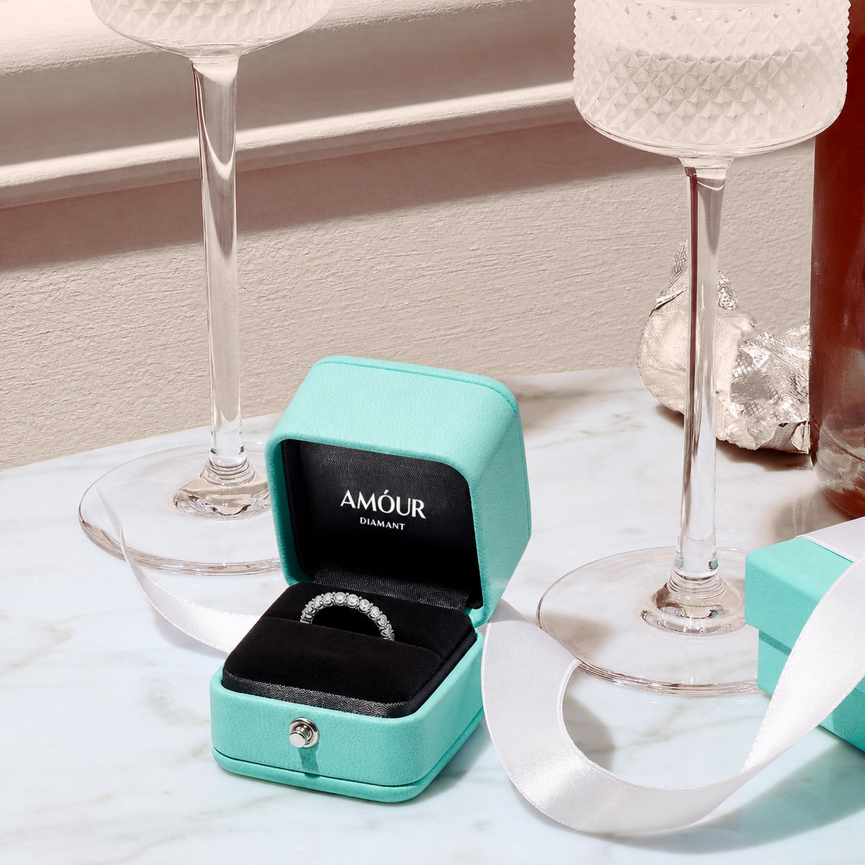 Estuche turquesa para anillo Amour Diamant y embalaje de presentación de la marca